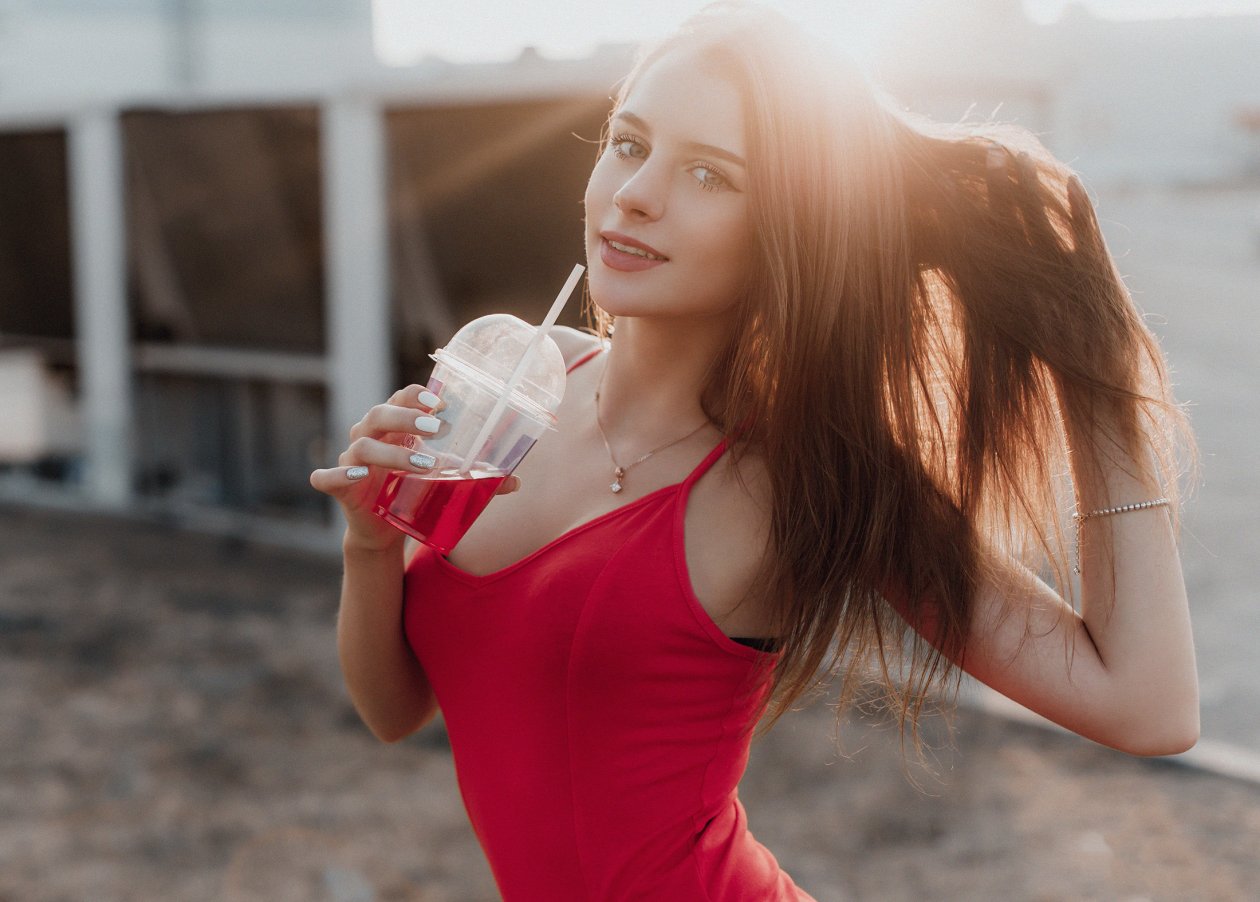 Girl Smiling Drink In Hands