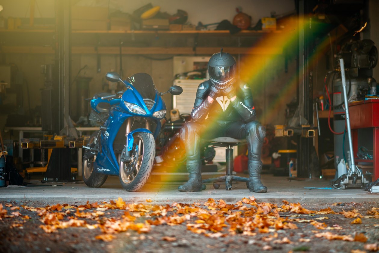 Rider With Daytona 675 Triple Sitting On Chair