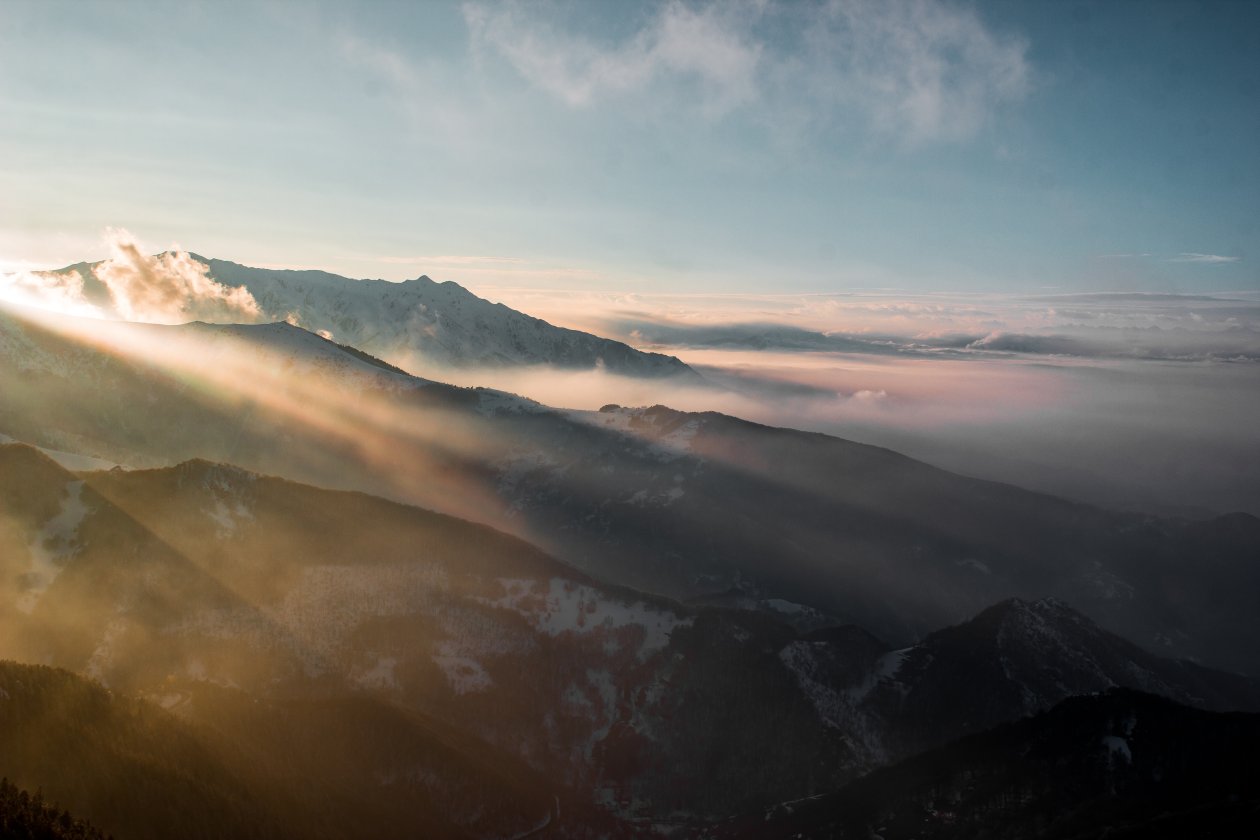 Sun Rays Through Mountains