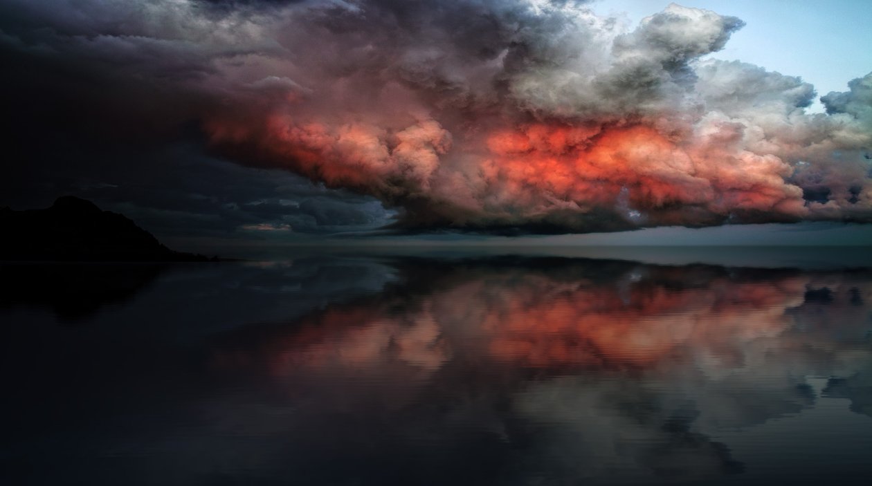 Storm Red Clouds Touching Ocean