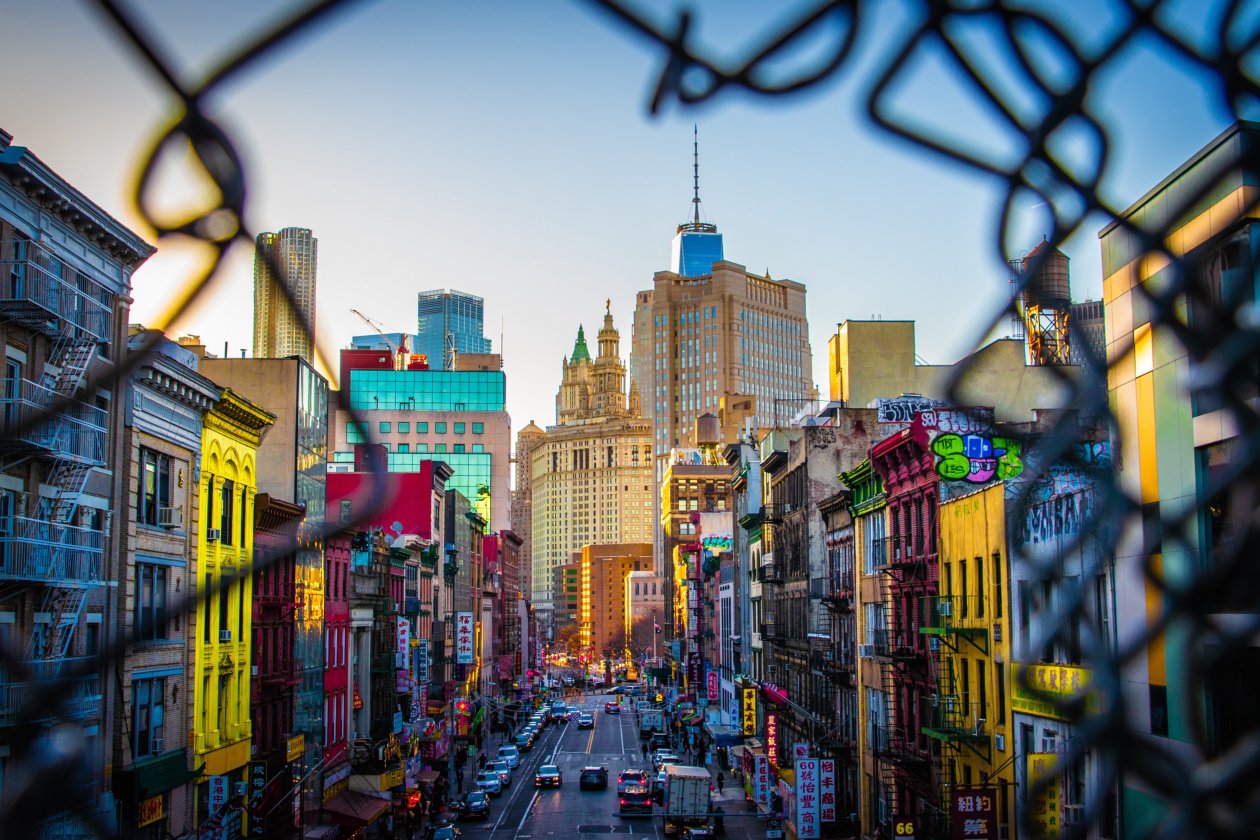 Colorful City View From Broken Fence Wall 5k