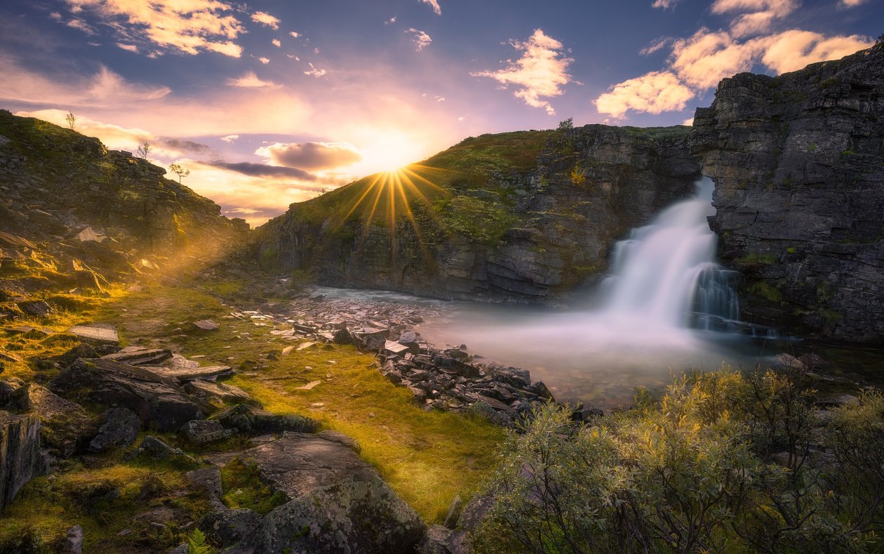 Beautiful Waterfall And Sunrise