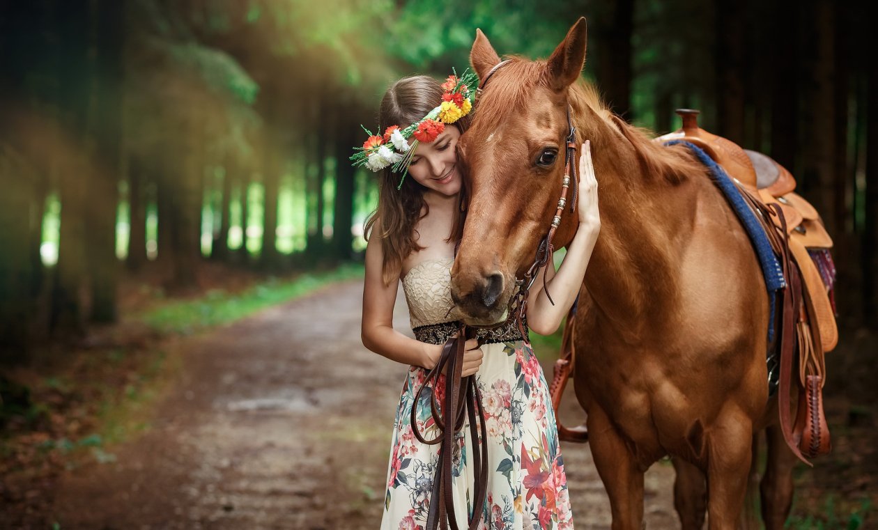 Cute Girl Smiling With Horse Outdoors