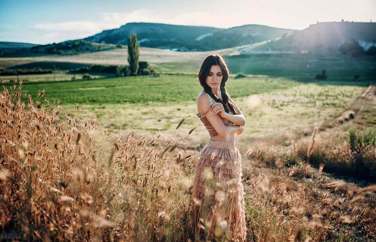 Girl Outdoors In Field Sunlight