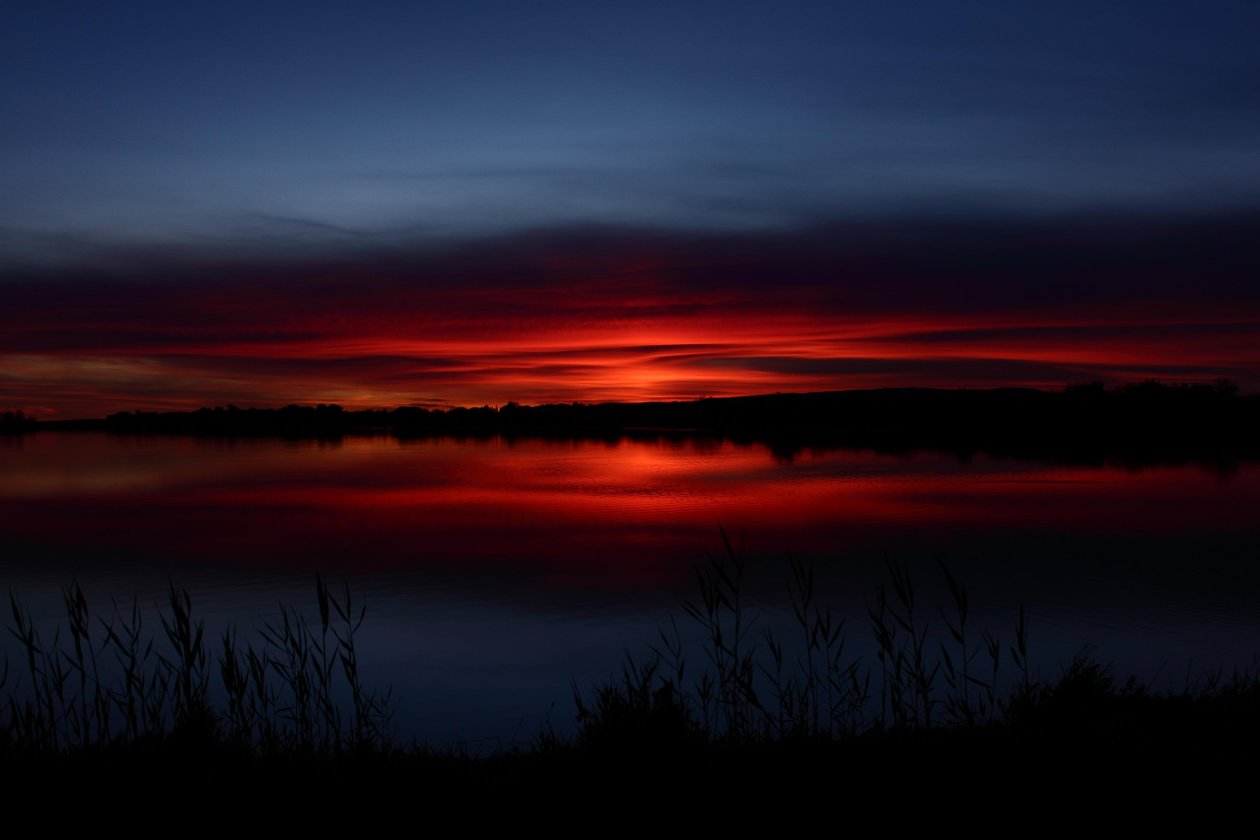 Sun Setting Over A Pond Near Montpellier France