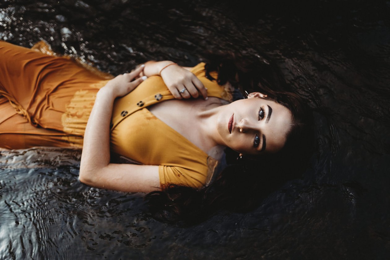 Girl Lying Down Orange Dress 4k