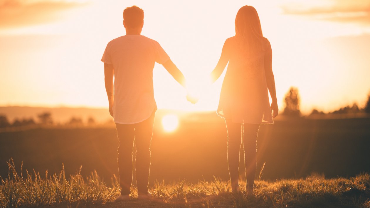 Men And Women Holding Hands