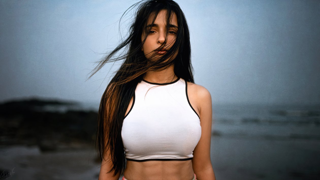 Black Hair Flying Over Face