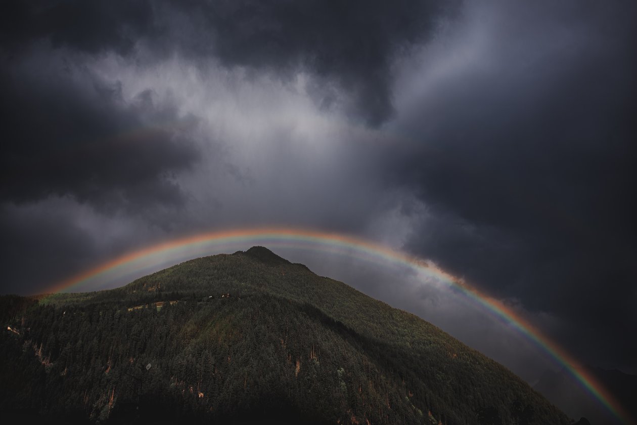 Rainbow Over Mountain Landscape