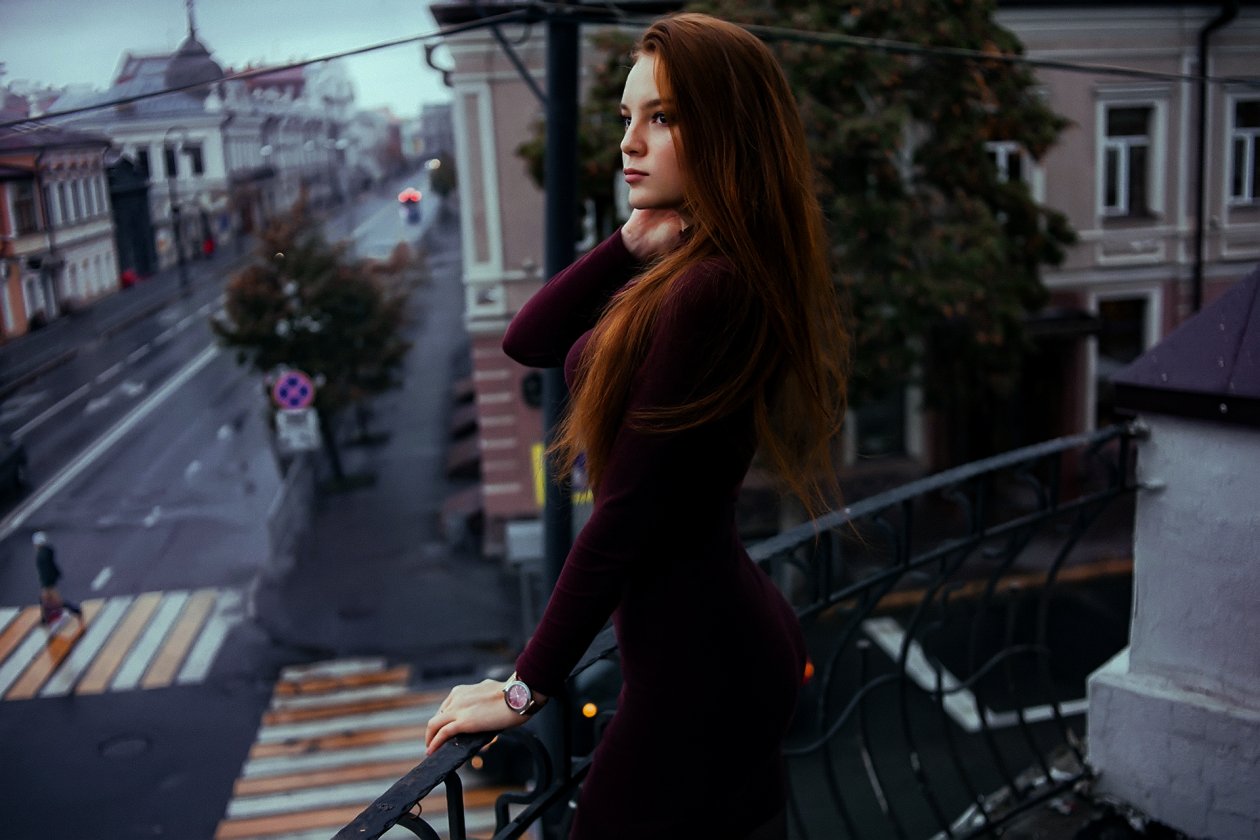 Red Hair Women In Balcony