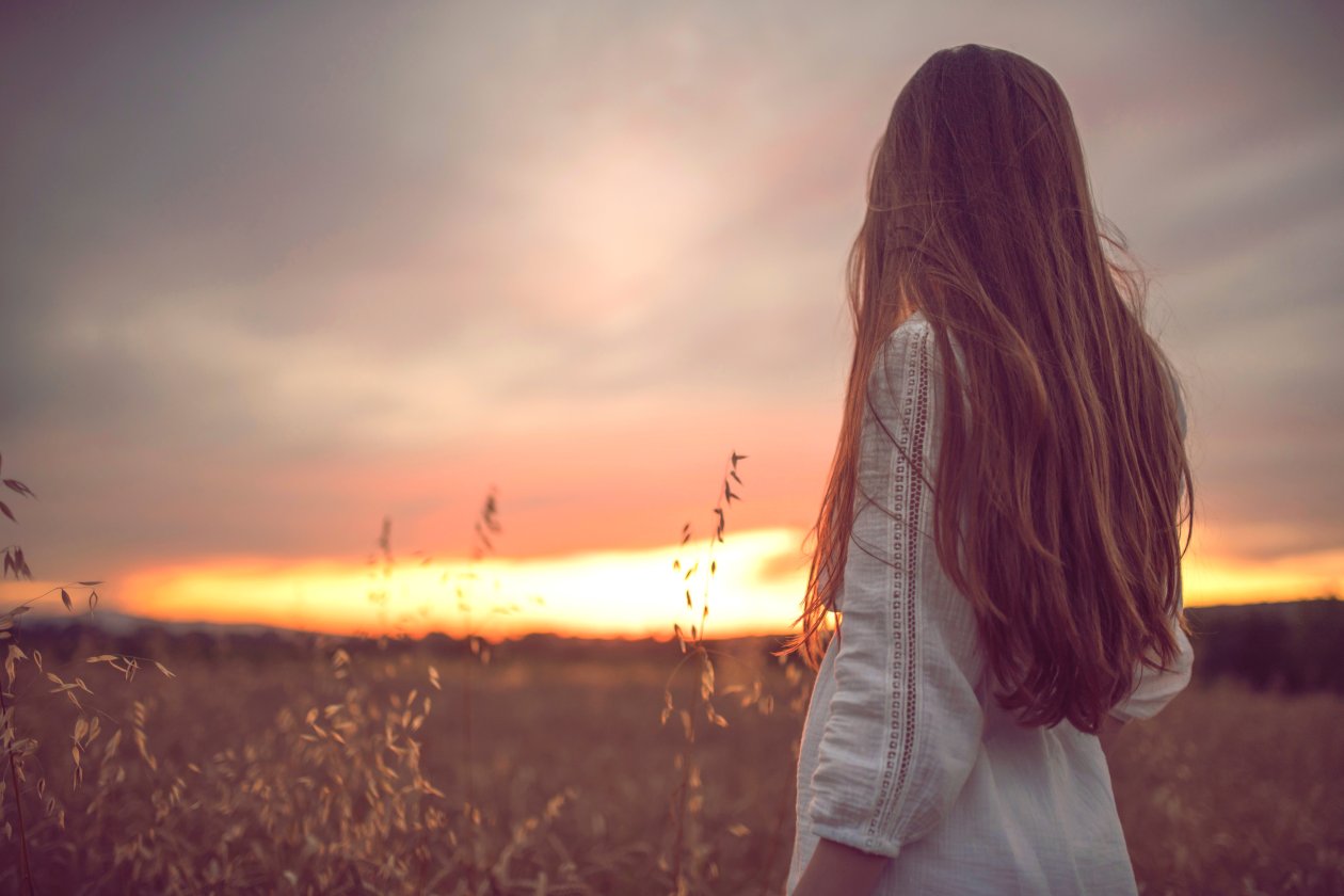 Girl In Nature Of Field