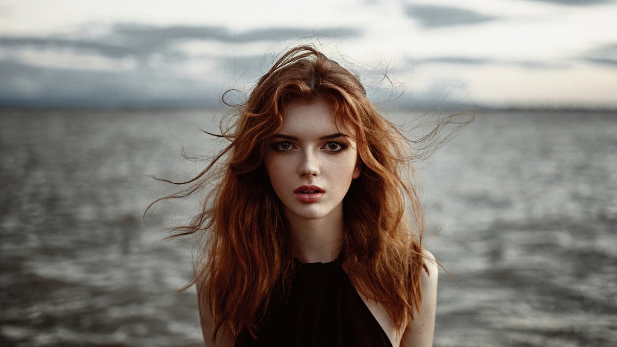 Redhead Model Wavy Hair Looking Directly