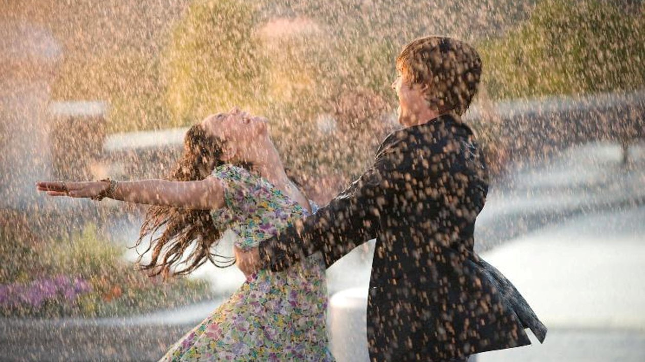 Beautiful Couple In Rain