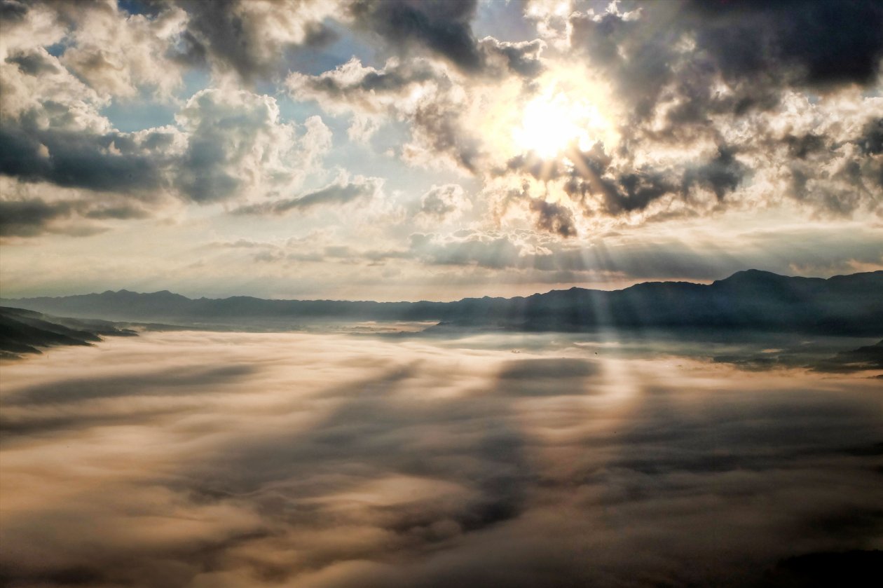 Sun Rays Through Clouds Mountains
