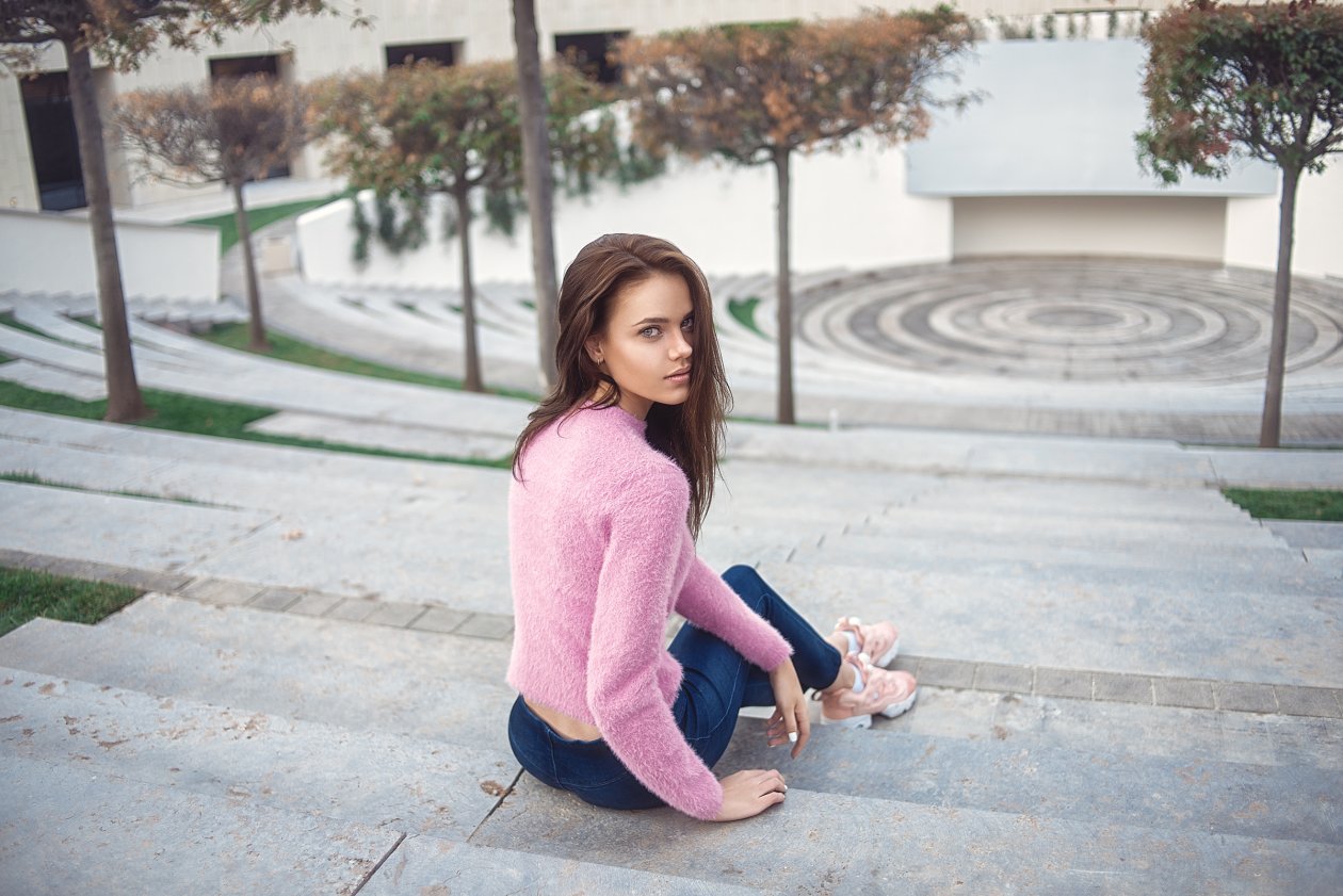 Beautiful Girl Sitting In Stairs