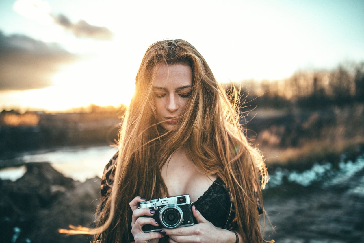 Girl Holding Camera