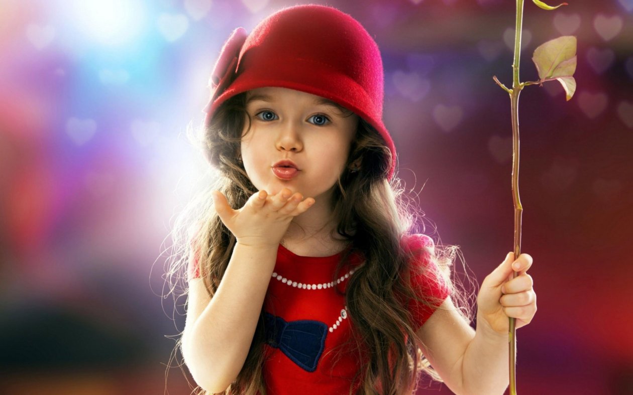 Little Girl Blowing a Kiss