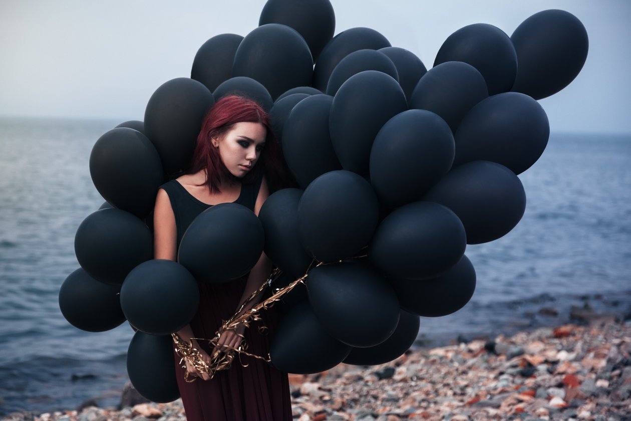 Girl With Black Ballons