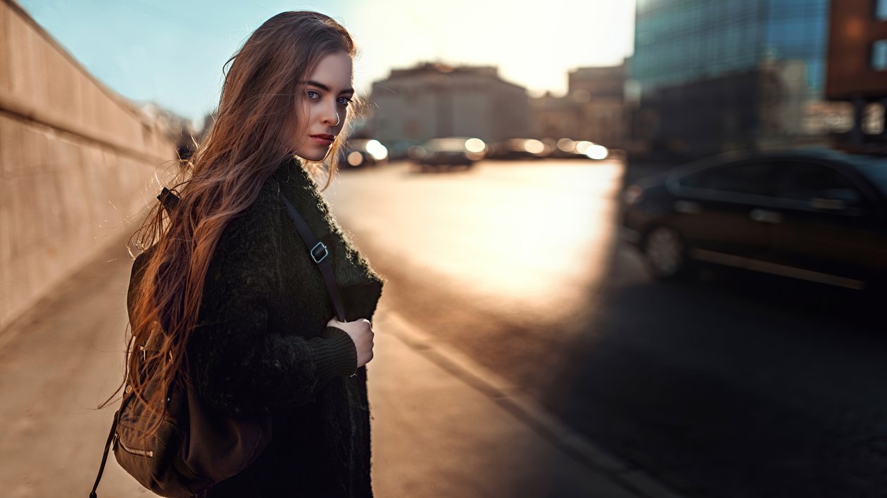 Girl With Bag Looking Back