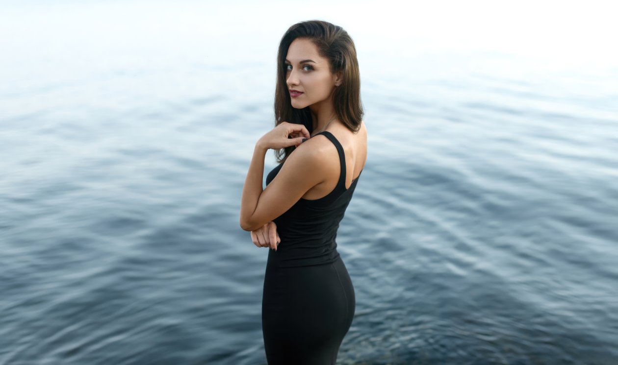 Girl Black Dress Smiling Looking Back