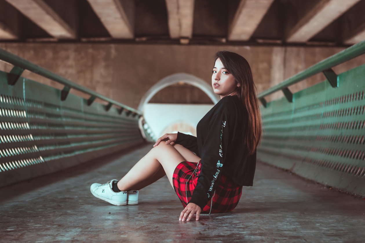 Girl Skirt Outfit Sitting Looking Back 4k