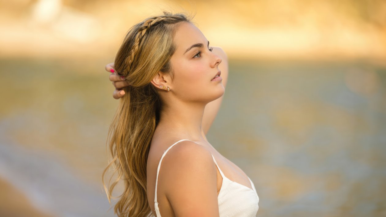 White Dress Girl Adjusting Hairs