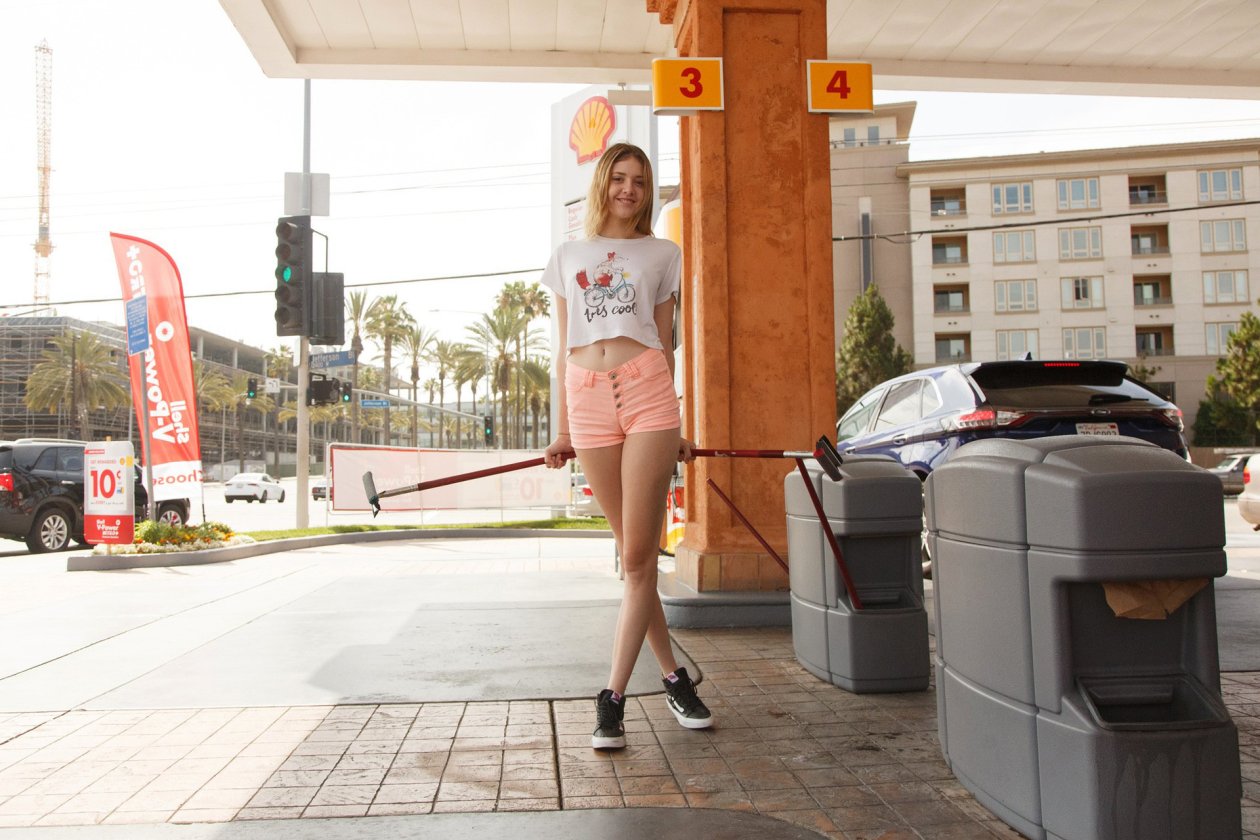 Cute Girl In Gas Station
