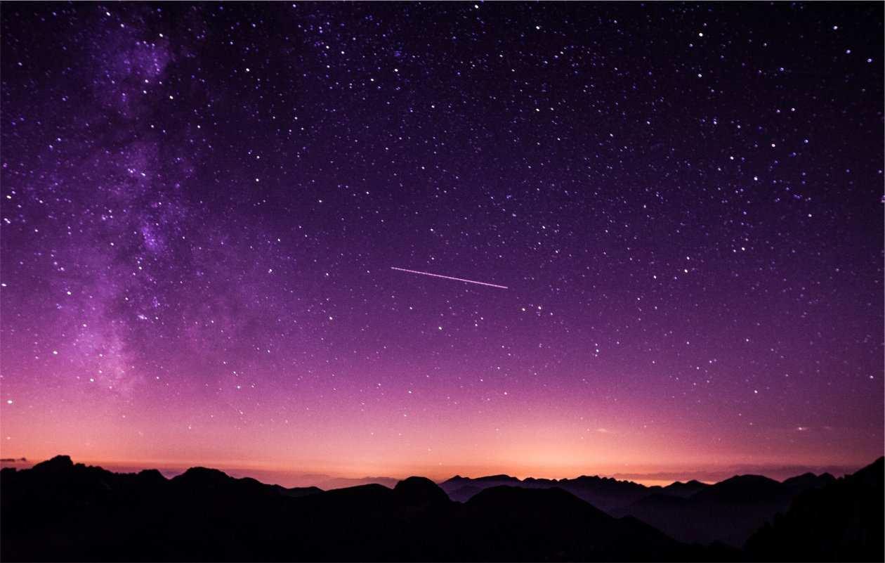 Shooting Stars In Purple Sky