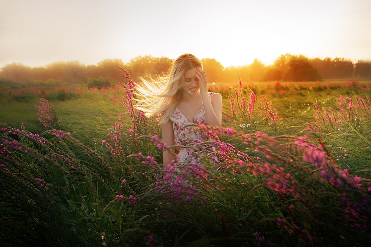 Blonde Girl Outdoors In Field