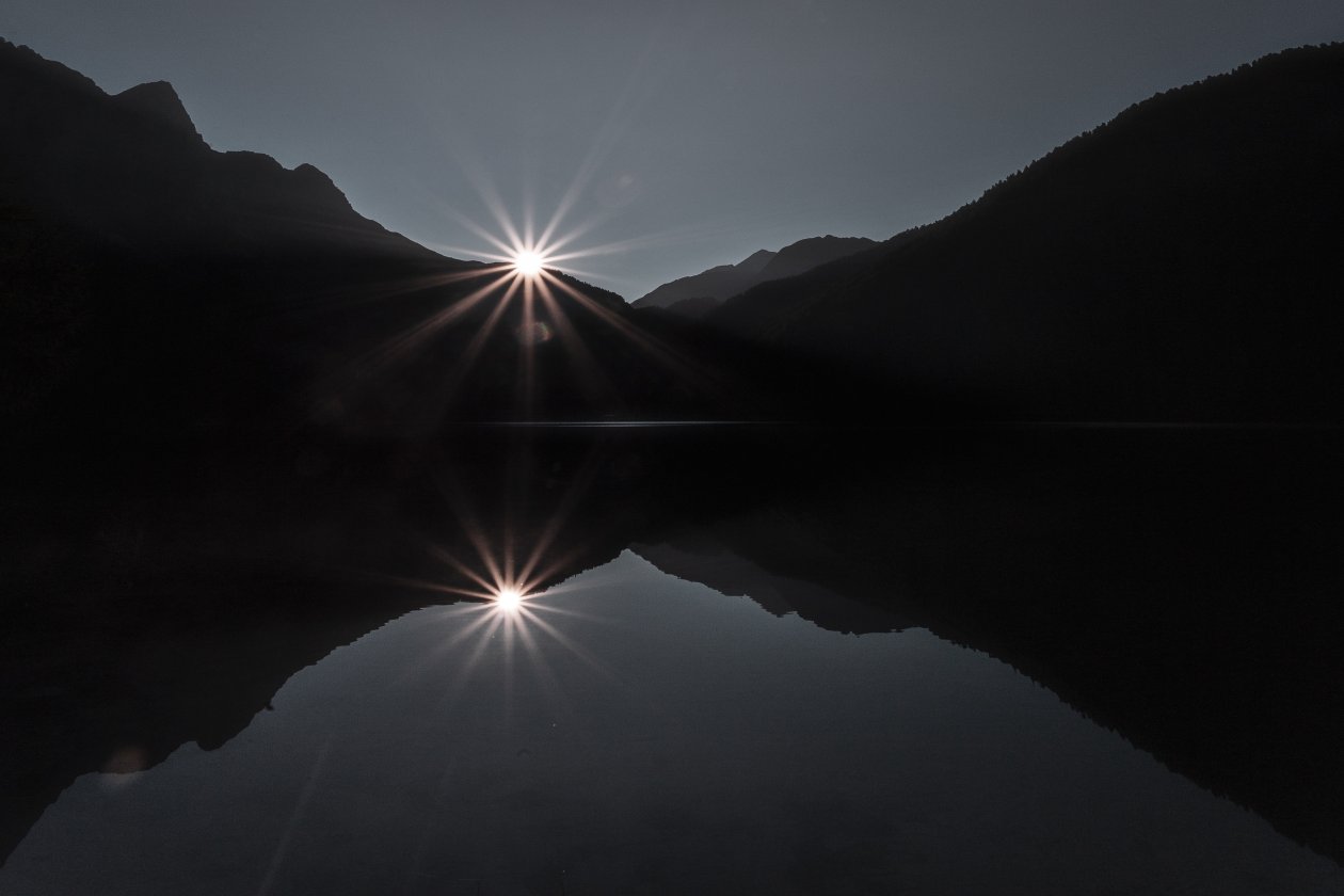Silhouette Of Mountain Near Body Of Water 4k