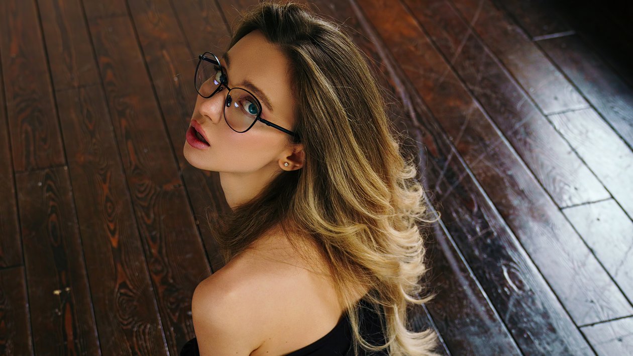 Girl In Glasses Looking Back
