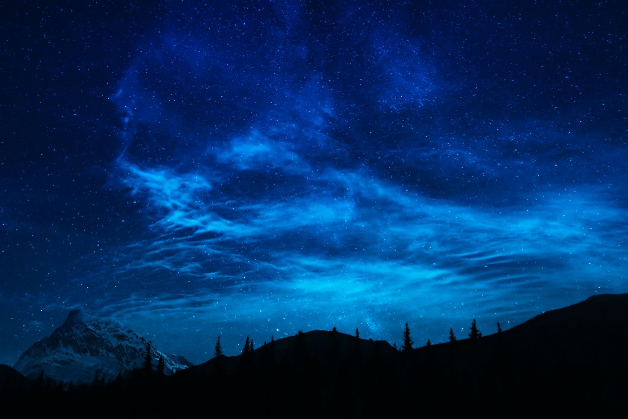 Summer Night Sky Full Of Stars Over Mountain Landscape