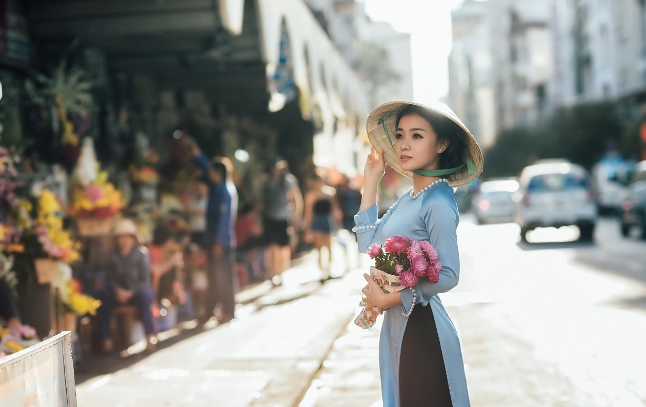 Girl Standing With Bouquet Flowers
