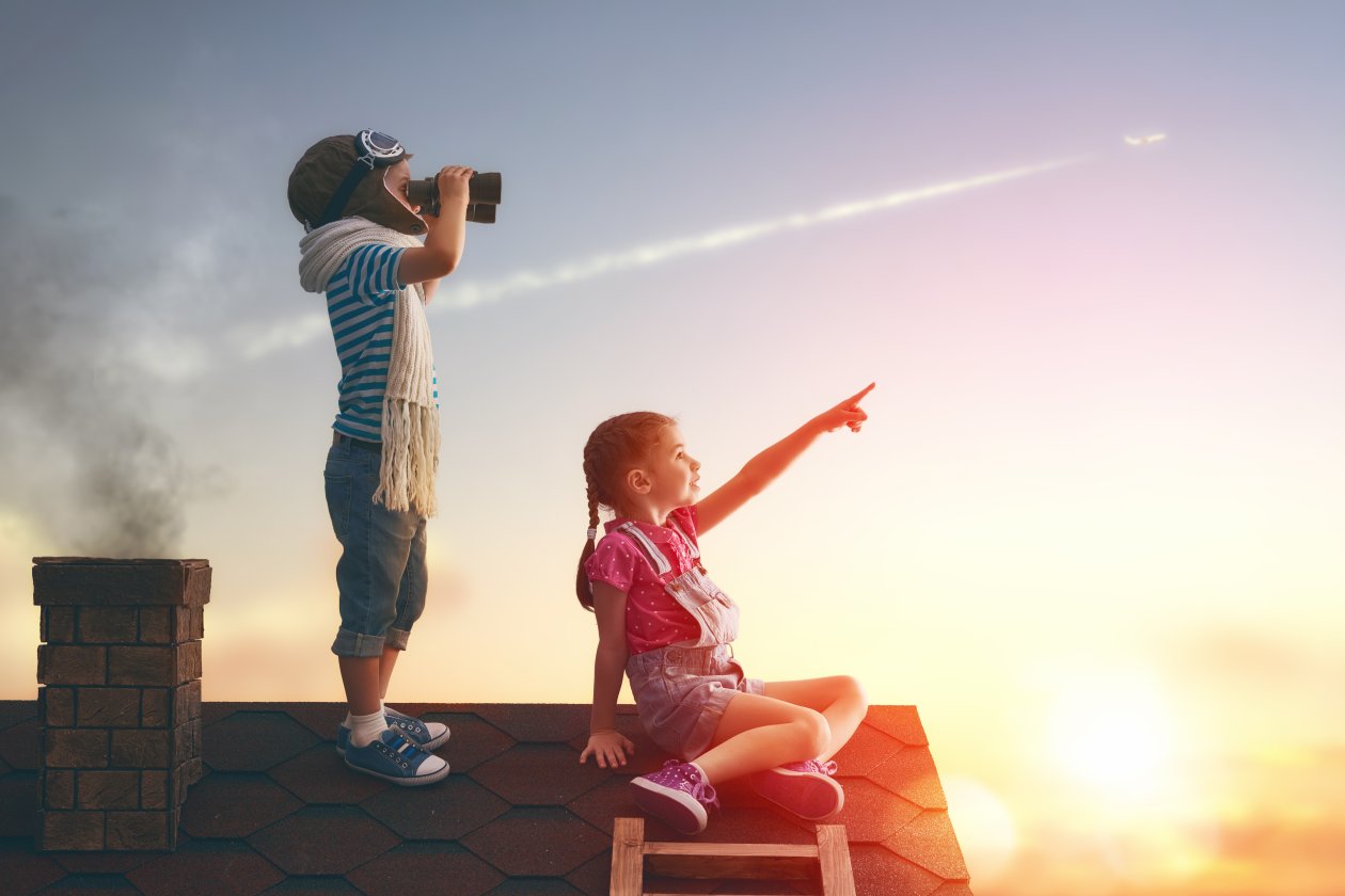 Little Childrens On Roof Watching Sky