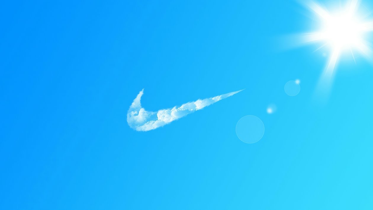 Nike Logo In Clouds 4k