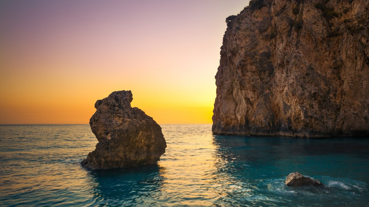 Sea Boulders Sky Sunrise