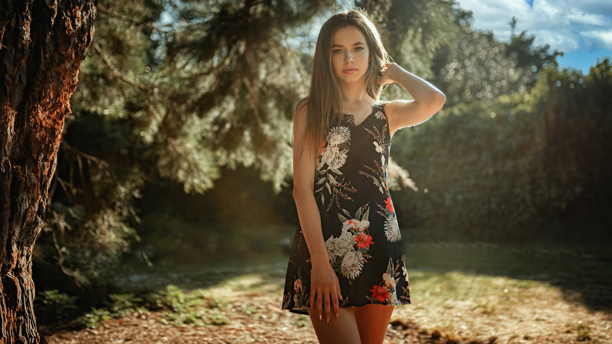 Sun Rays Model Hands In Hair Looking At Viewer 4k
