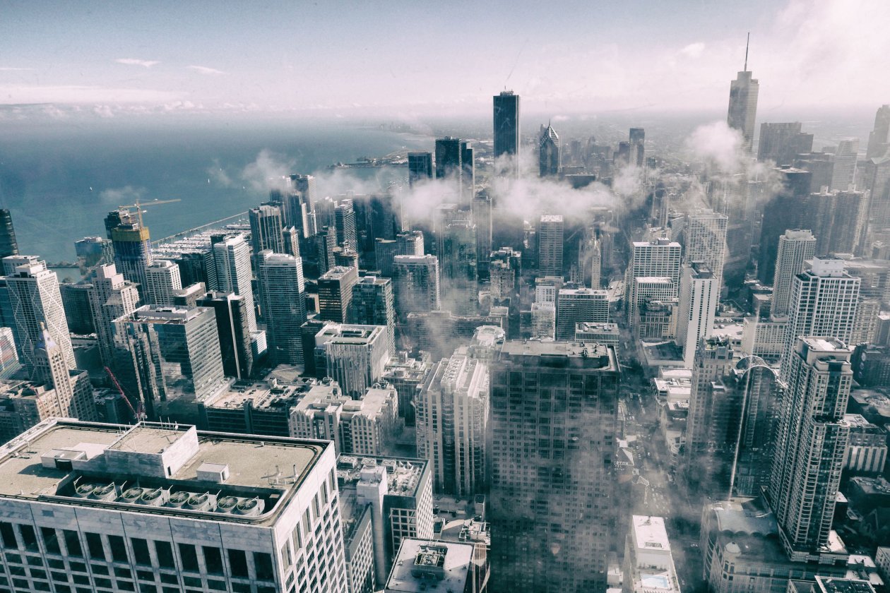 Aerial View Of Buildings Smoke Fog Monochrome