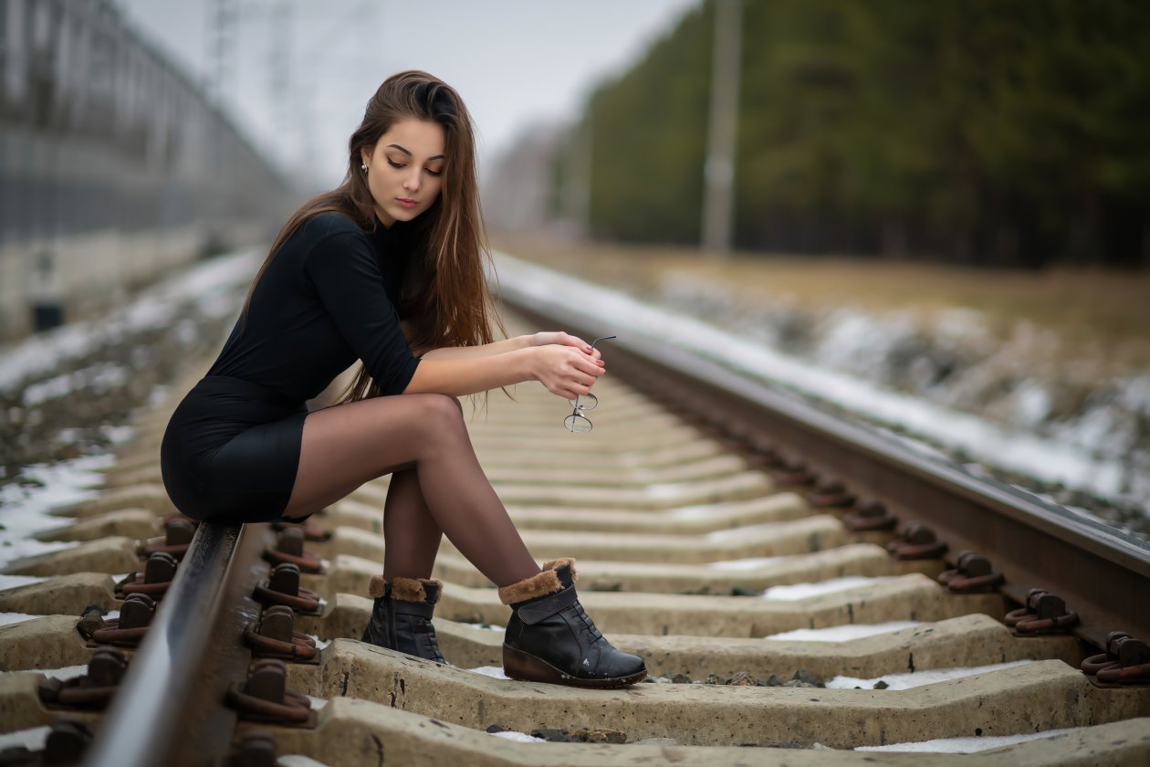 Girl Sitting On Railway Line 4k