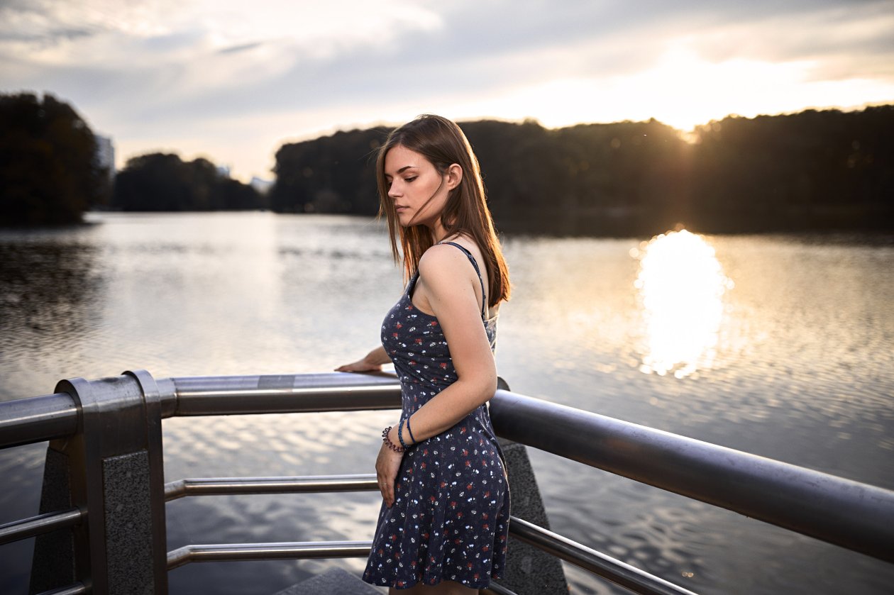 Pretty Girl Standing On The Pier Near The Sea Marina