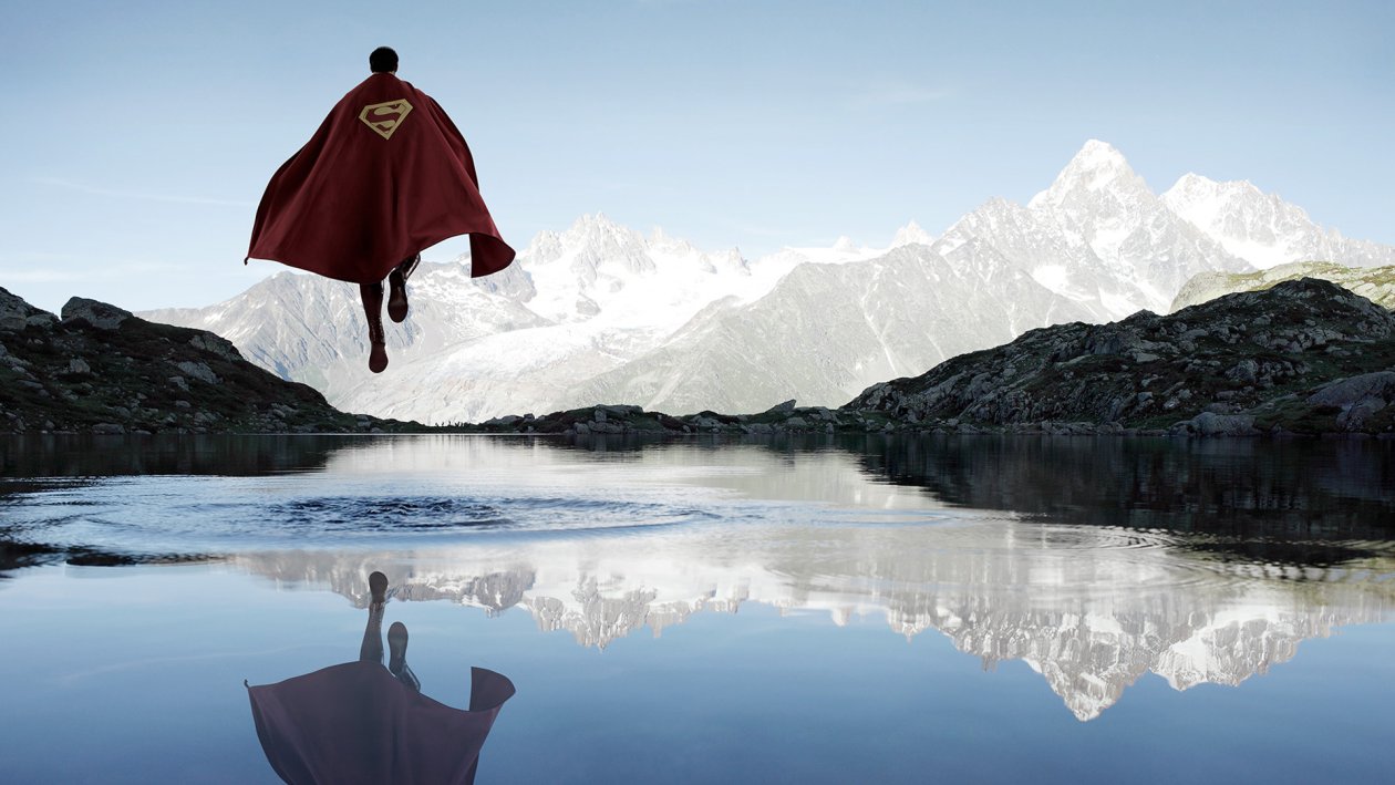 Superman Flying Above The Water