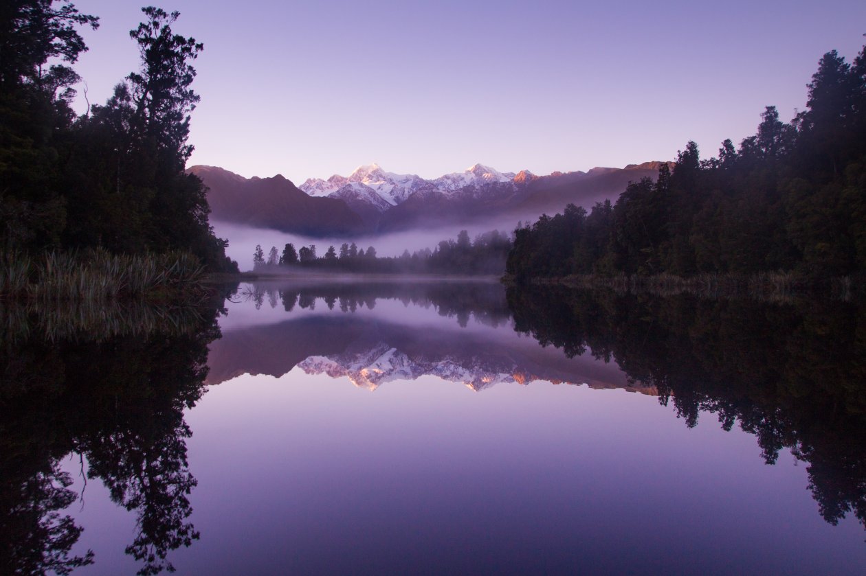 Beautiful Purple Weather Landscape Of Lake Matheson