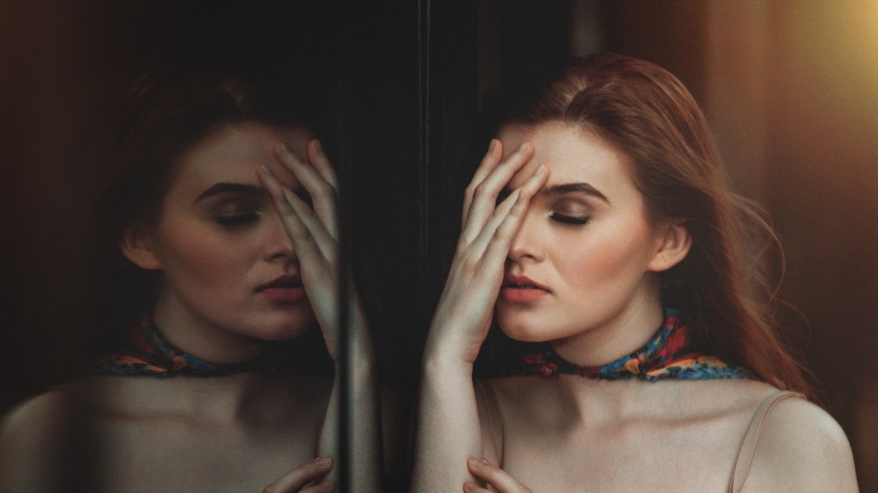 Women Standing In Front Of Glass Closed Eyes