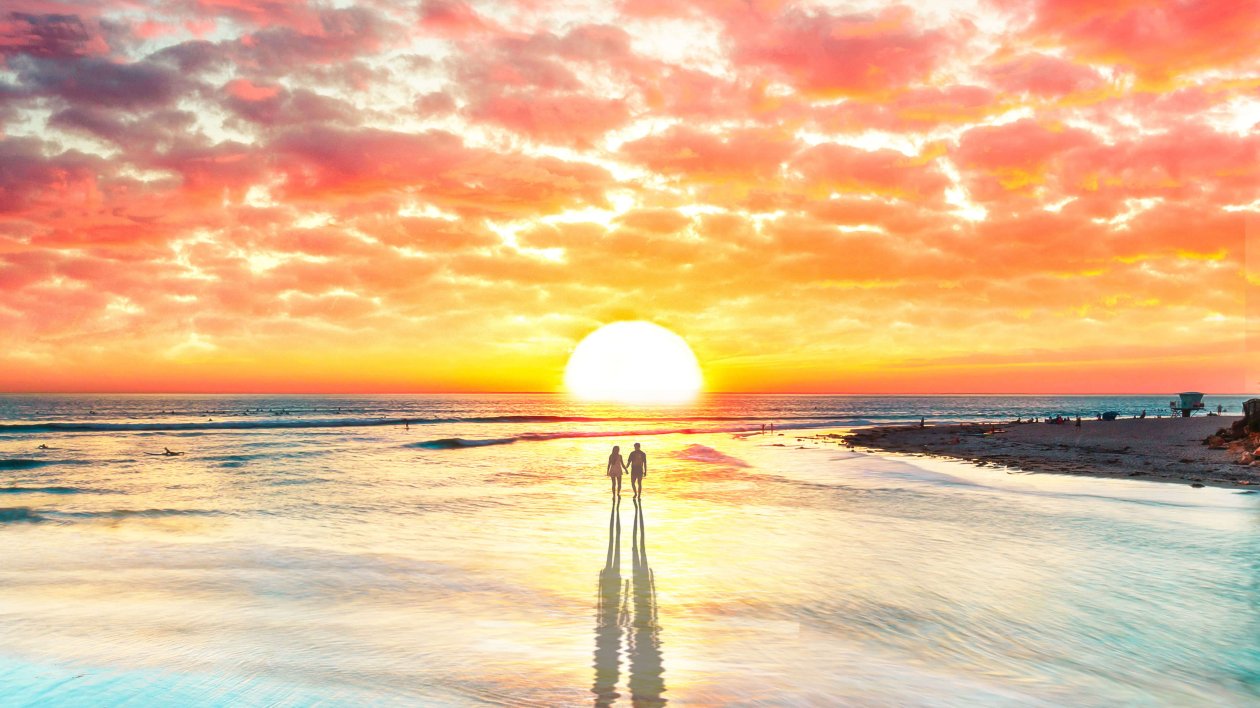 Beach Couple Watching Sunset 4k