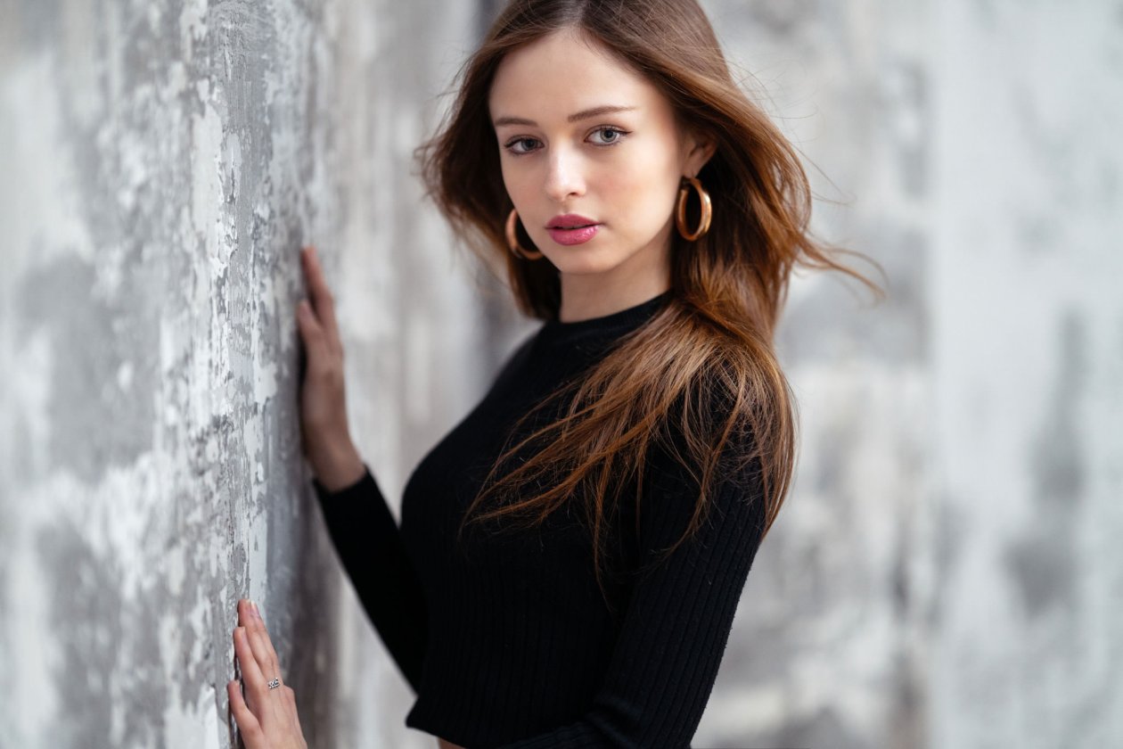 Red Head Model Posing With Wall
