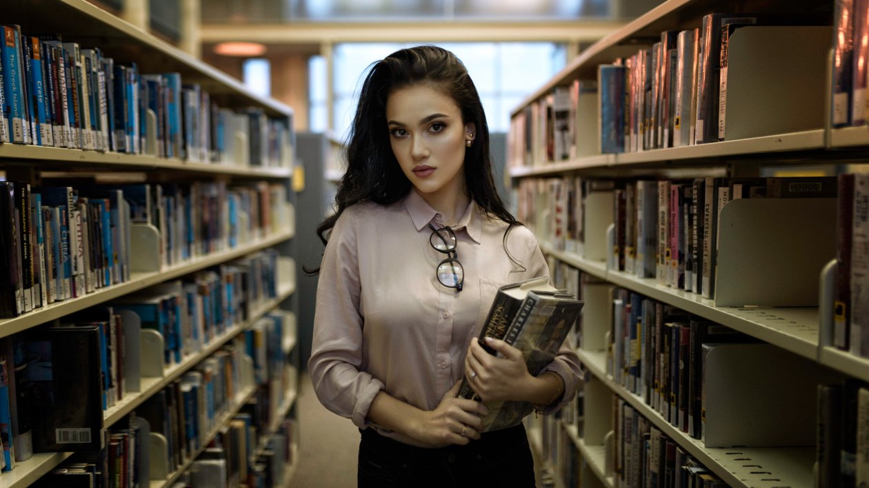Women With Books In Library
