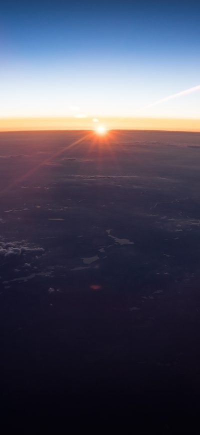 Fond d'écran iPhone Aerial View Of White Clouds During Sunset Outside Airplane