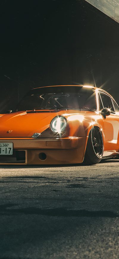 Fond d'écran Orange Porsche 4k sur iPhone