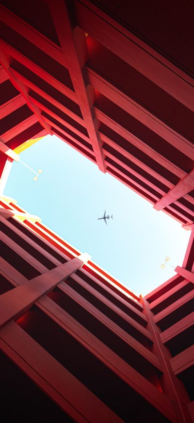 Fond d'écran iPhone Plane View Between Architectural Building 8k