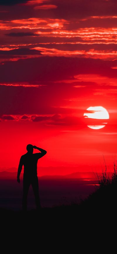 Fond d'écran iPhone Silhouette Of Man During Red Sun